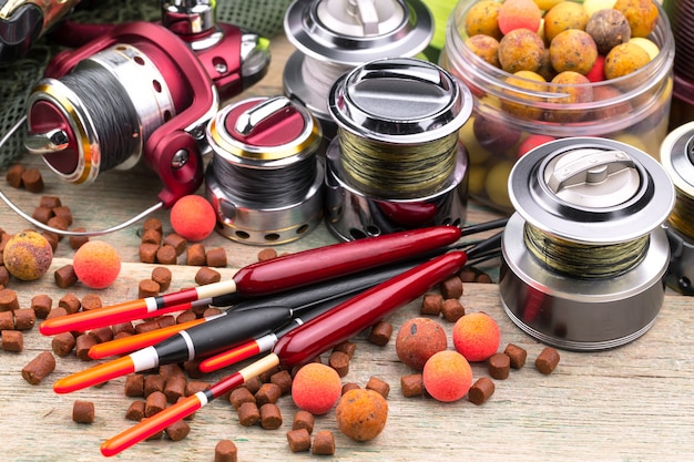 fishing tackle on a wooden table