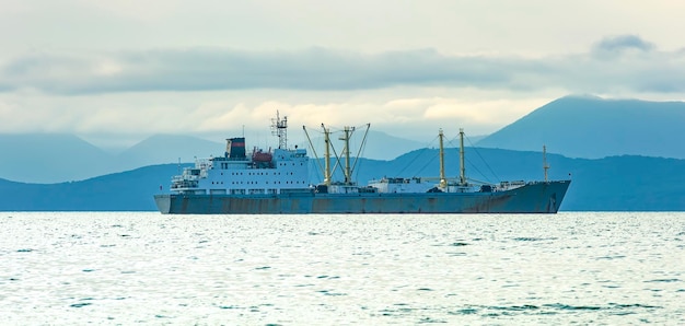 Fishing trawler in the bay on the roads in kamchatka peninsula