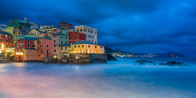 The fishing village of Boccadasse in the center of Genoa, Italy, illuminated by night