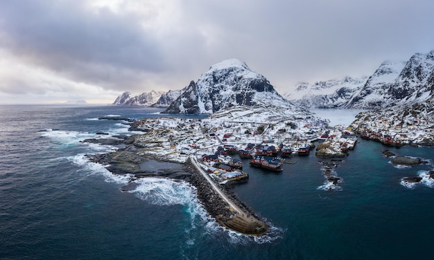 Fishing Village A, Rorbu, Sea and Mountains in Winter. Moskenes, Lofoten Islands. Landscape of Norway. Aerial View.