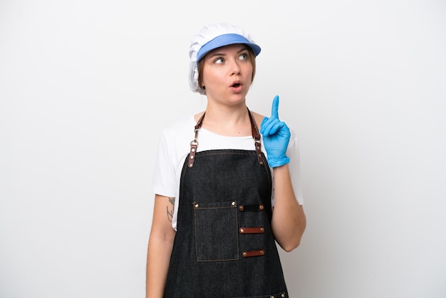 Fishmonger woman wearing an apron thinking an idea pointing the finger up