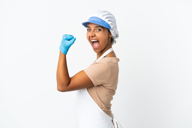 Fishwife asian woman over isolated wall doing strong gesture