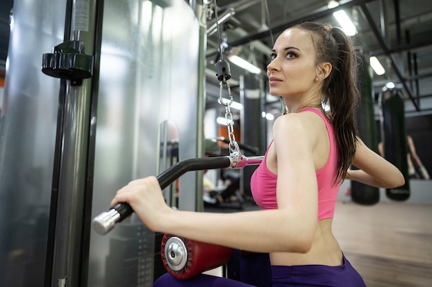 Fit woman exercising building muscles