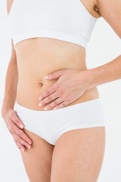 Fit woman with stomach pain