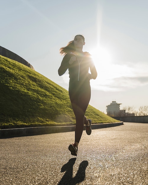 Fit young woman jogging outdoor