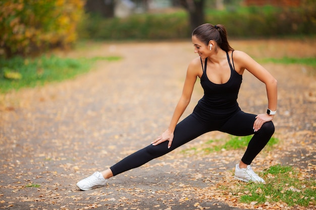 Fitness, Beautiful young woman doing exercises in the park