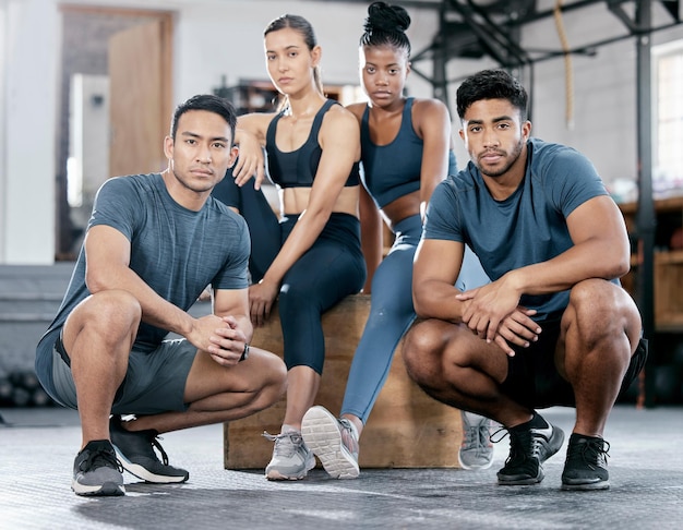 Fitness diversity and portrait of people in gym for teamwork support and workout Motivation coaching and health with friends training in sports center for cardio endurance and wellness challenge