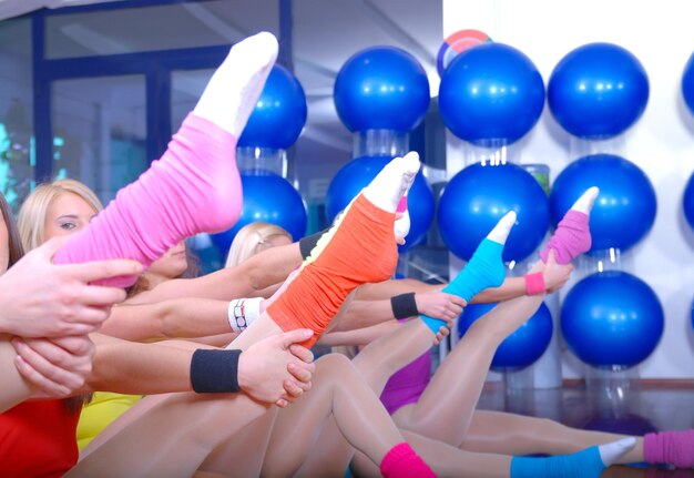 fitness exercise with girls and colorful socks in focus