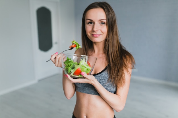 fitness girl eating healthy food