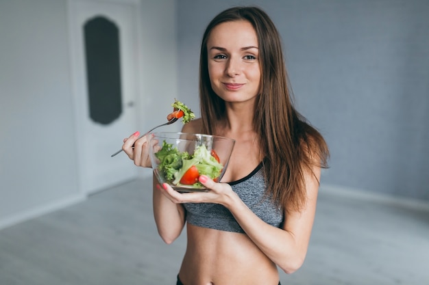 fitness girl eating healthy food