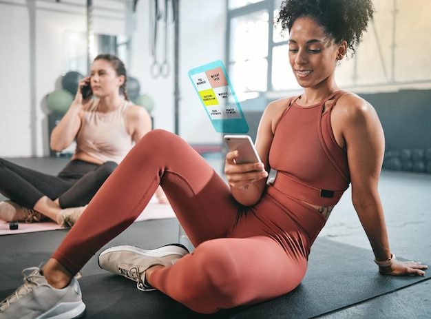 Fitness phone or black woman on social media at gym relaxing on a break after workout Girl overlay or healthy sports athlete resting scrolling on app after training with alert or notification