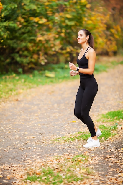 Fitness. Woman doing stretching exercise on park