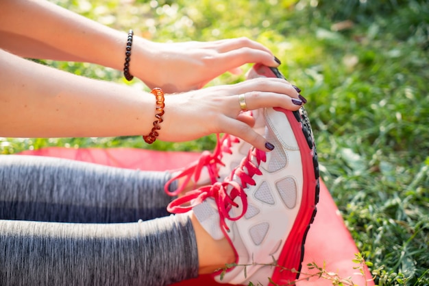 Fitness yoga girl doing excercises outdoor