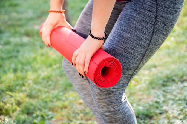 Fitness yoga girl doing excercises outdoor