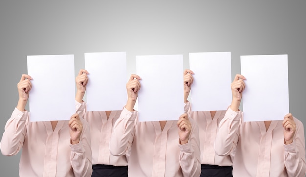 Five business woman cover her face with blank empty white paper