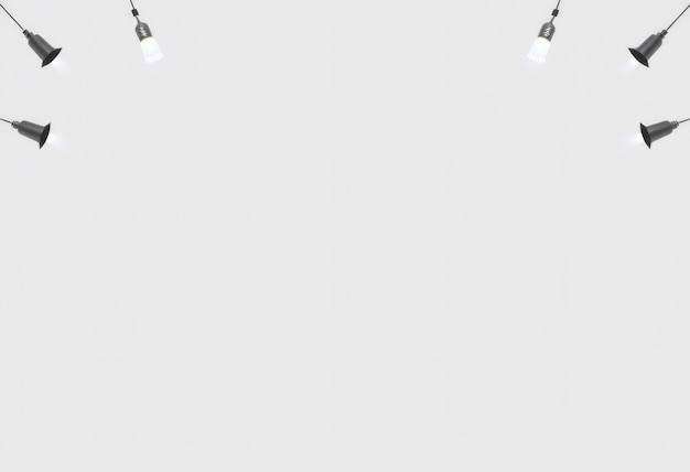 Photo five hanging light bulbs shine on a white background