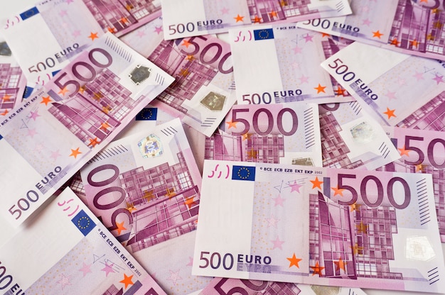 Five hundred euros banknotes flat lay chaos