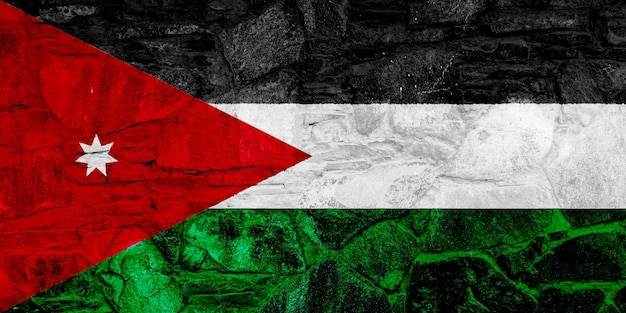 Photo flag of hashemite kingdom of jordan on a textured background concept collage