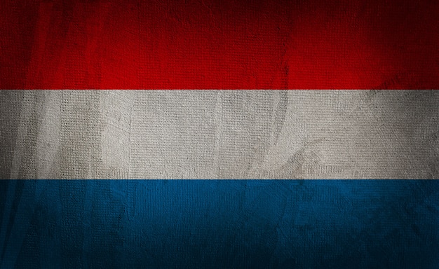 Flag of holland on the dark texture background