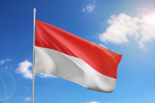 Flag of Indonesia on blue sky 3d illustration