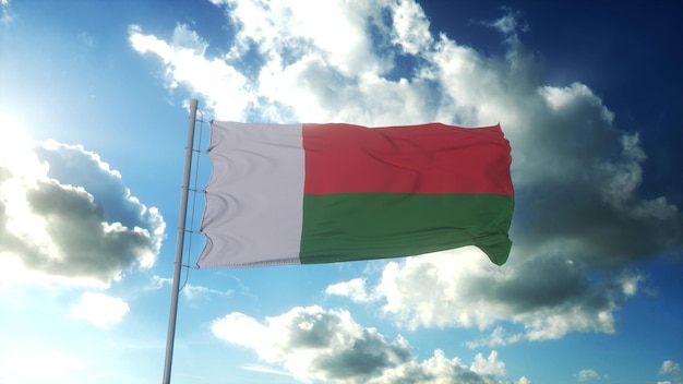 Flag of Madagascar waving at wind against beautiful blue sky 3d rendering