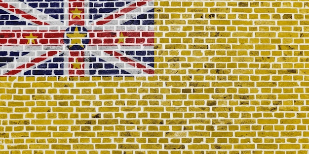 Flag of Niue painted on a brick wall