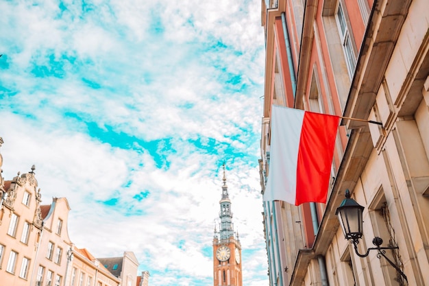 Flag of poland poland national flag in cloudy blue sky gdansk poland high quality photo