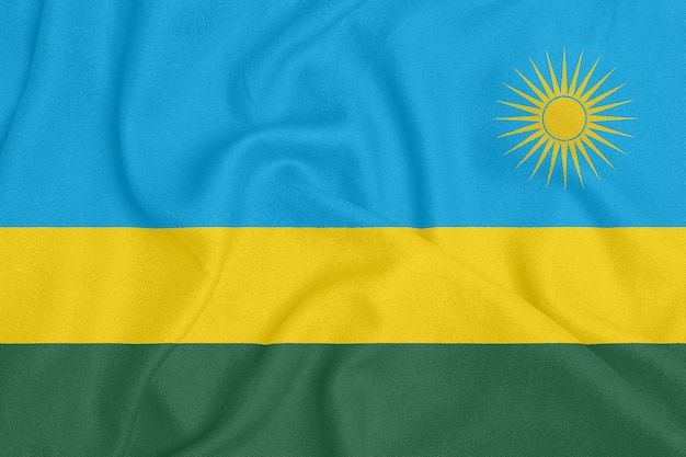 Flag of Rwanda on textured fabric.