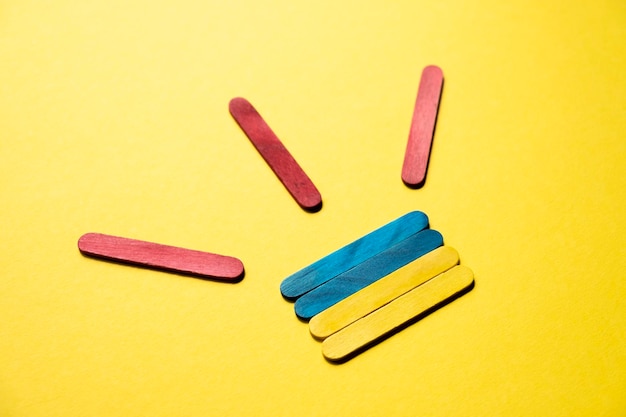 Flag of ukraine made of wooden colored sticks. Red sticks are symbols of attention