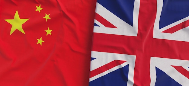 Flags of China and Great Britain Linen flag closeup Flag made of canvas Chinese flag Beijing UK United Kingdom State national symbols 3d illustration