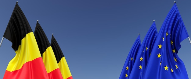 Flags of the EU and Belgian on flagpoles on the sides Flags on a blue background Place for text European Union Belgian flag Brussels Commonwealth 3D illustration