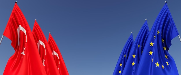 Flags of the EU and Turkish on flagpoles on the sides Flags on a blue background Place for text European Union Turkish flag Istanbul Commonwealth 3D illustration