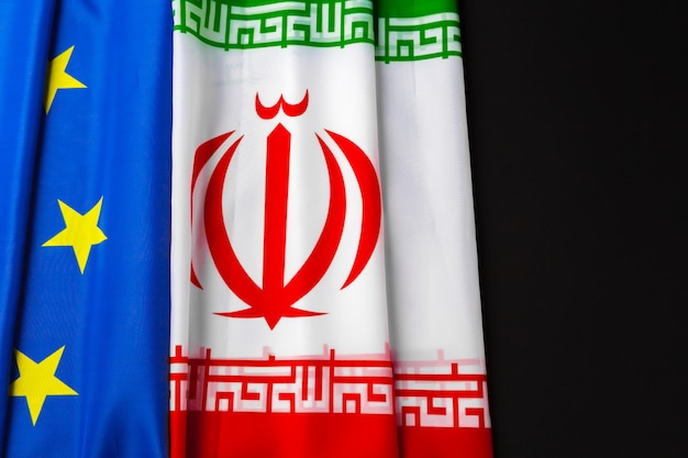 Flags of Iran and European Union flag together