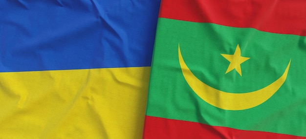 Flags of Ukraine and Mauritania Linen flags closeup Flag made of canvas Ukrainian Kyiv Nouakchott National symbols 3d illustration