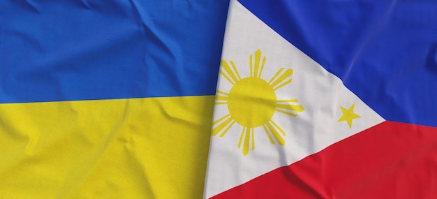 Flags of Ukraine and Philippines Linen flags closeup Flag made of canvas Ukrainian flag Manila Asia State national symbols 3d illustration