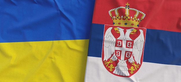 Flags of Ukraine and Serbia Linen flag closeup Flag made of canvas Ukrainian flag Serbian State national symbols 3d illustration