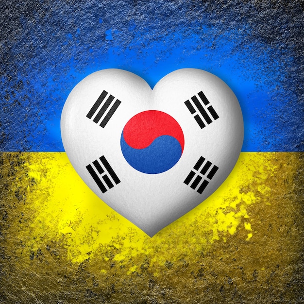 Flags of Ukraine and South Korea Flag heart on the background of the Ukrainian flag