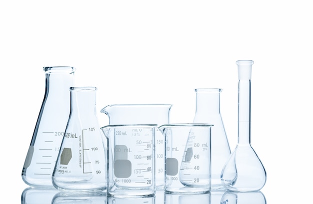 Flasks and measuring beakers on a white background