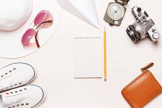 Flat lay accessories traveler on a white background