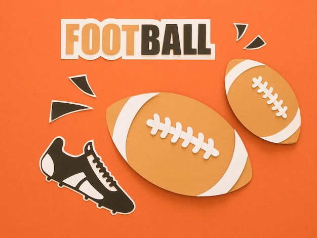 Flat lay of american footballs with sneaker