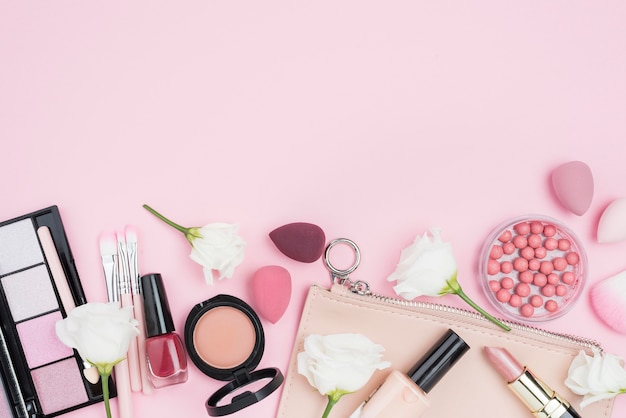 Flat lay assortment of different cosmetics with copy space