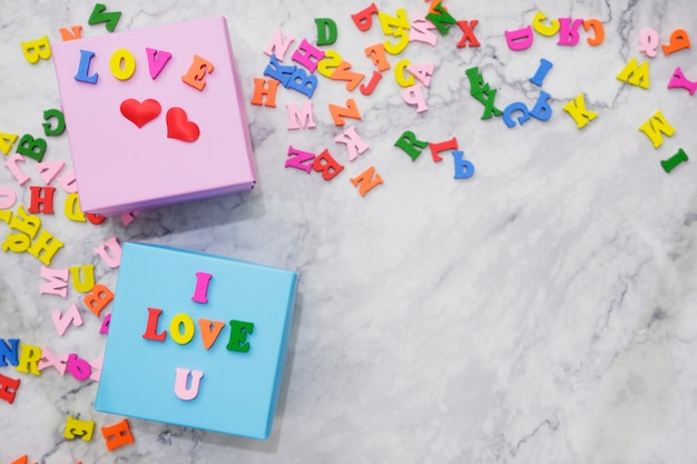 Flat-lay background for Valentine's Day, love, hearts, gift box Copy space