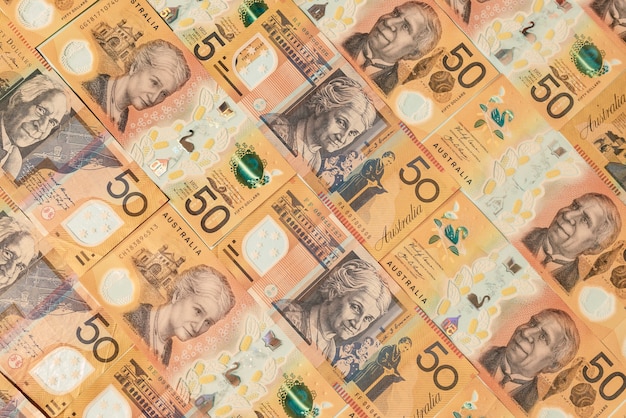 A flat lay composition picture of Australian dollar notes.