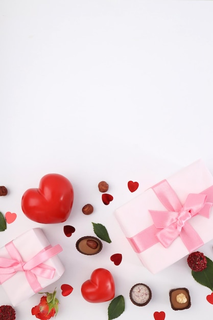 Flat lay composition with Valentine day accessories on white background