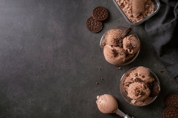 Flat lay delicious ice cream and cookies