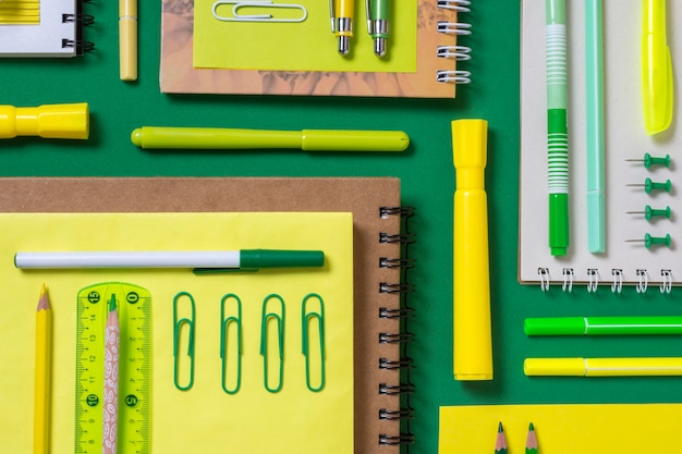 Flat lay desk arrangement with notebooks