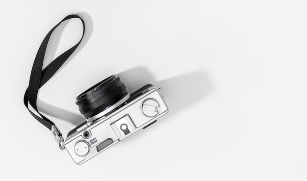 Photo flat lay film camera isolated. top view