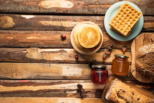 Flat lay food frame on wooden background