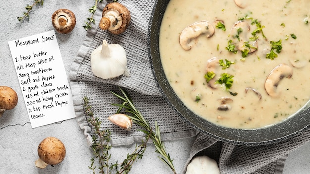 Flat lay of food ingredients with soup and mushrooms