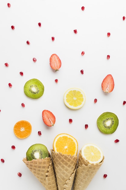 Flat lay of fruits and ice cream cone concept